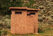 Vaulted Toilet