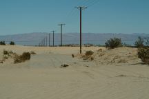 Main road covered with sand