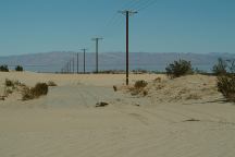 Main road covered with sand